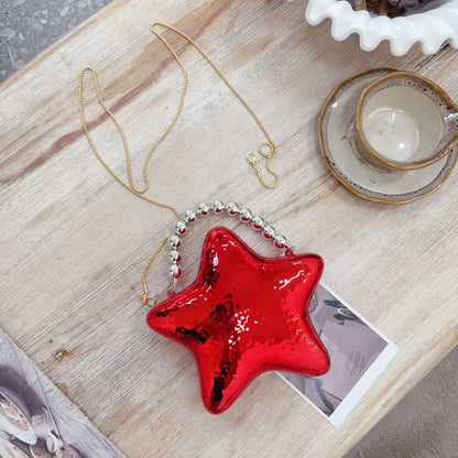 Women's Metallic Star Evening Clutch Crossbody Bag - Model Wearing Style