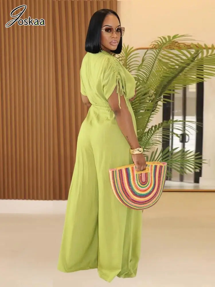 Women's Cutout Flare Wide Leg V-neck Romper Green – Side View