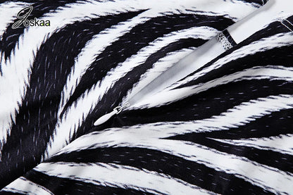 Women's Zebra Print Zip Up Long Sleeve Bodycon Romper - Model Wearing Style